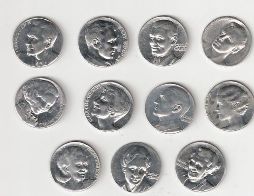Lot of 11 Movie Star Popsicle coins   Tokens  