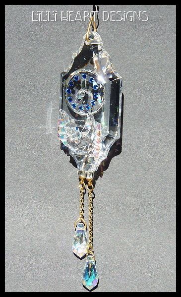 CUCKOO CLOCK AND BIRD MADE FROM SWAROVSKI CRYSTAL RETIRED  