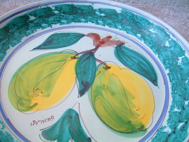  charger / serving plate measures 14.75 Wide in diameter X 2 Deep 